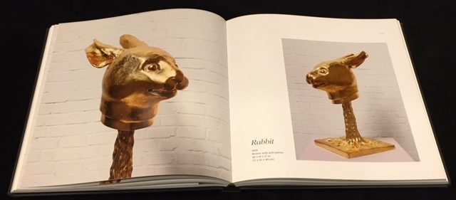 Ai Weiwei: Circle of Animals, page spread with gold fountainheads