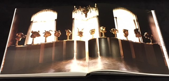 Ai Weiwei: Circle of Animals, page spread with gold fountainheads