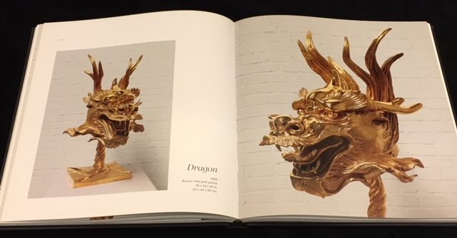 Ai Weiwei: Circle of Animals, page spread with gold fountainheads